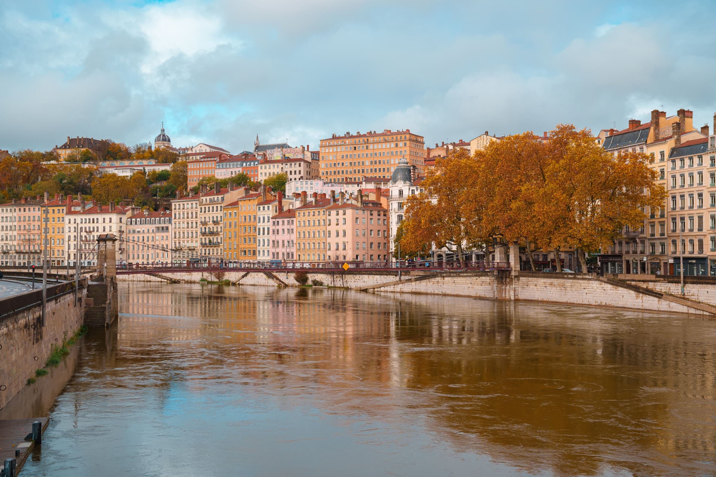 Lyon's riverside facades along the Saône in autumn